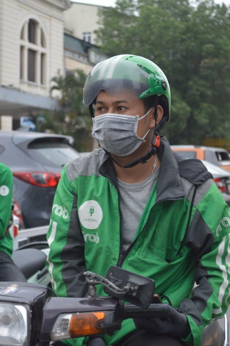 Grab Bike driver in traffic