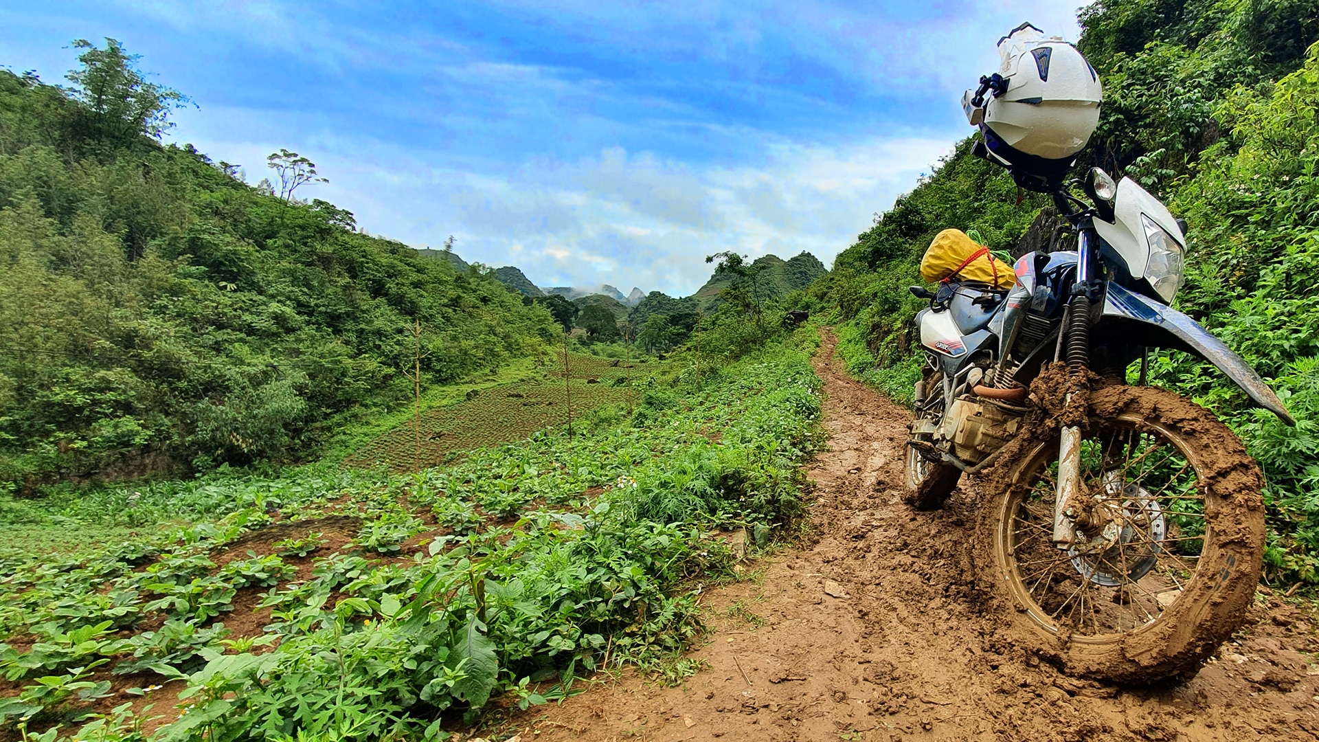 Honda XR on a muddy road in Mai Chau, North Vietnam