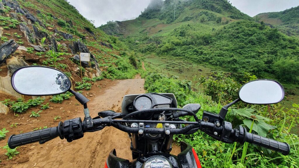 handlebars and a Mai Chau dirt road