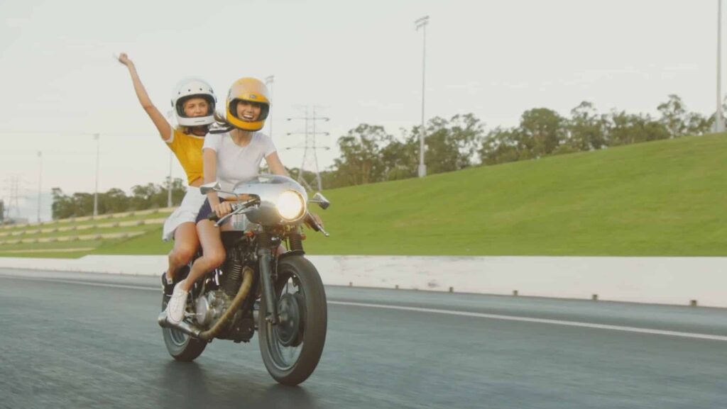 Girls riding on the dyke road in hanoi vietnam