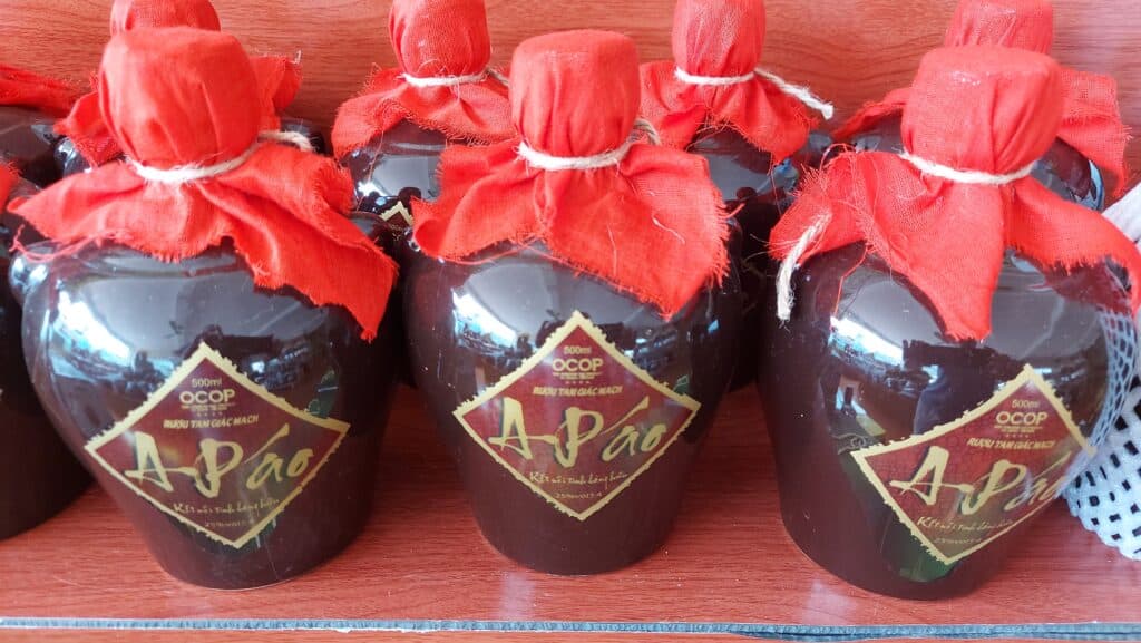 bottles of rice wine for sale in meo vac ha giang