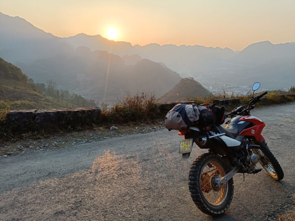 XR150 on a remote Cao Bang road at sunset