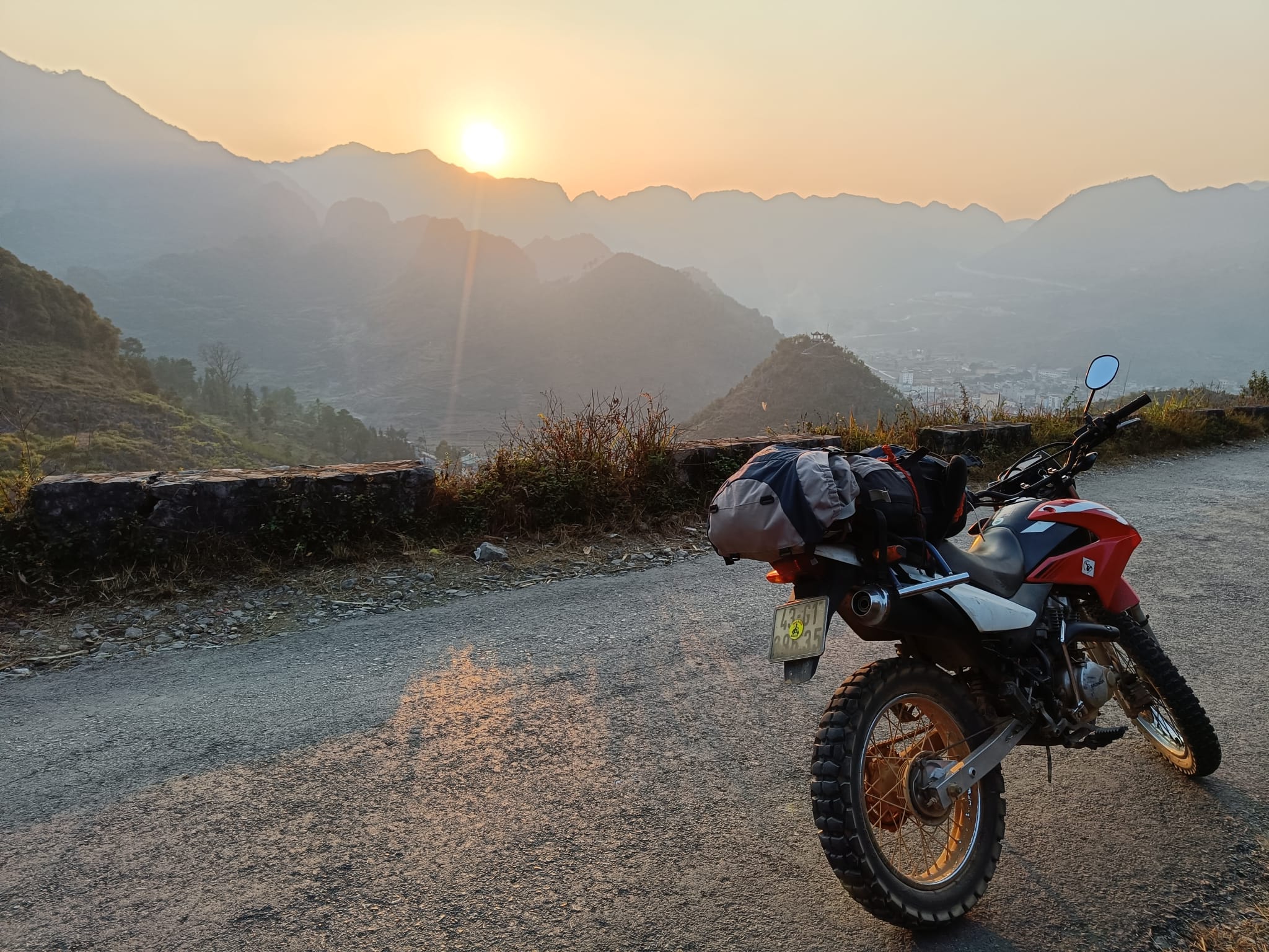 XR150 on a remote Cao Bang road at sunset