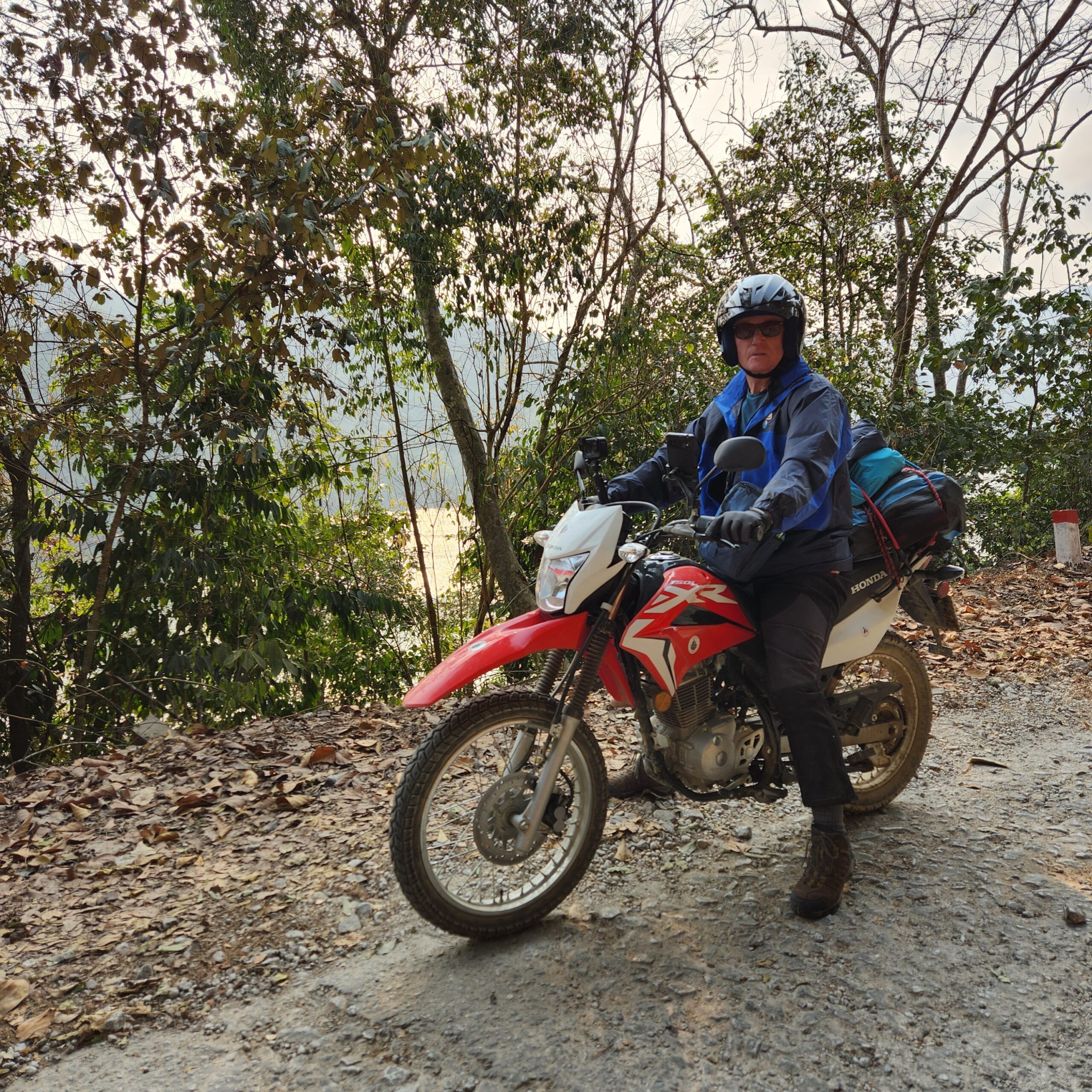 Paul Brooke and the Honda XR150 on the loop road around Ba Be Lake