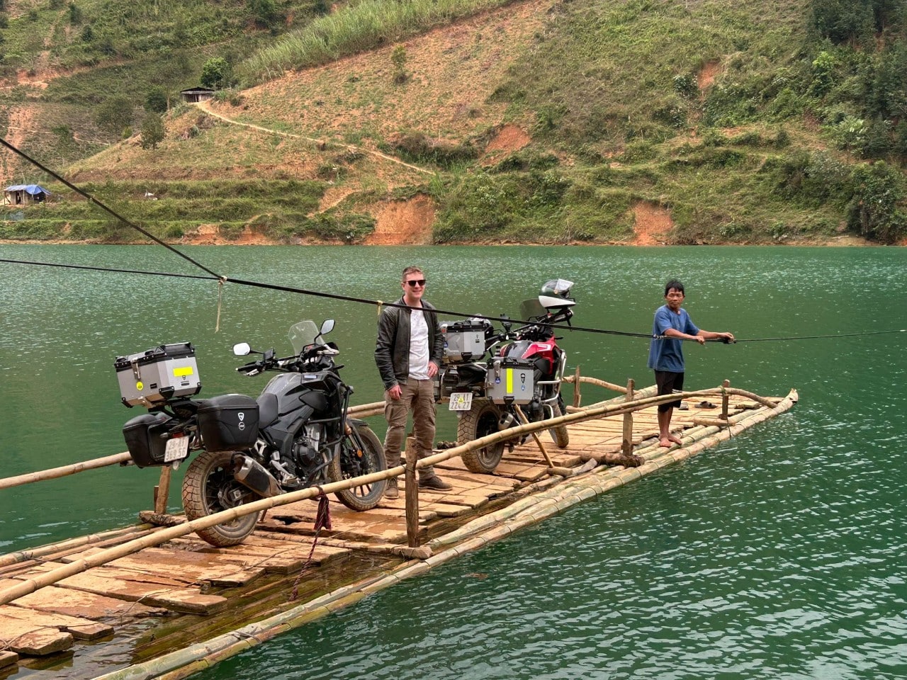 CB500x riders on the bamboo raft between Meo Vac and Cao Bang
