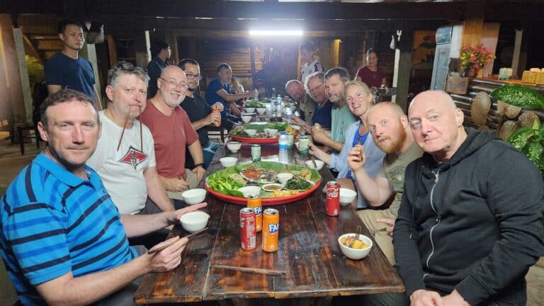 riders feasting ha giang homestay for dinner on 10 day due north tour
