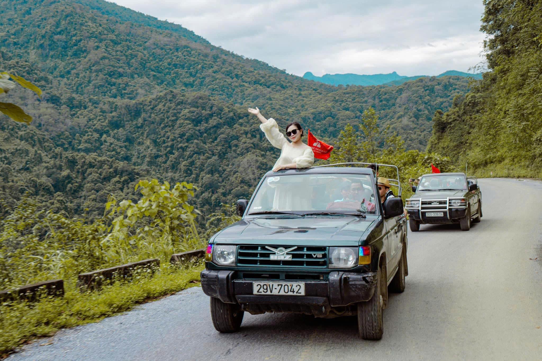 driving through the wild countryside of Ha Giang in a Jeep