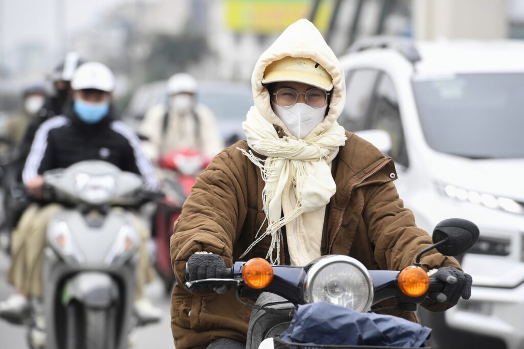 wrapped up for winter in northern vietnam