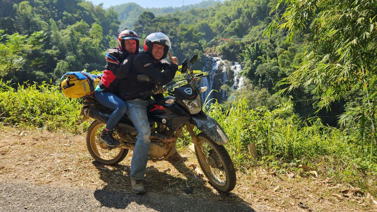 Lucy and James on a Honda XR150 at Go Lao Waterfall