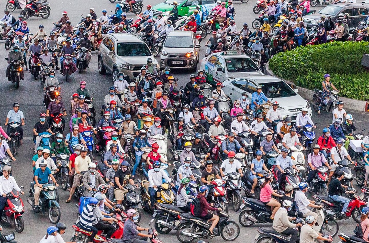 crowded roads full of motorbikes in vietnam